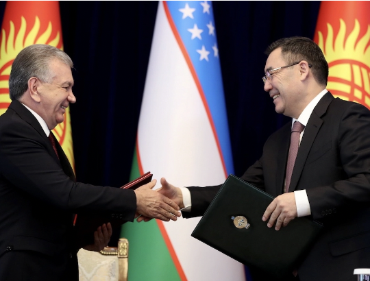 Mirziyoyev and Japarov exchanging warm greetings in Bishkek