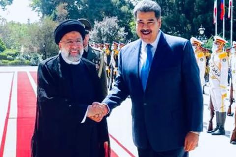 Ebrahim Raisi, Iran's president, greets Nicolas Maduro during his visit to the Islamic country last 