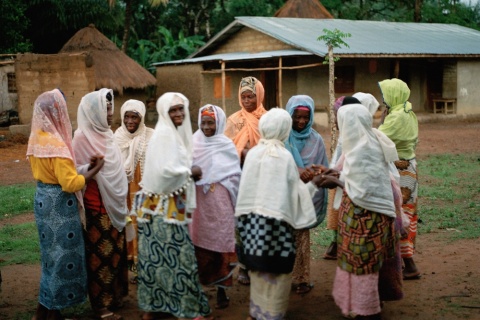 Women gather outside the mosque in Masethele, Bombali District, Sierra Leone.